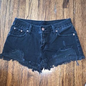 Black Levi’s 501 ripped jean shorts